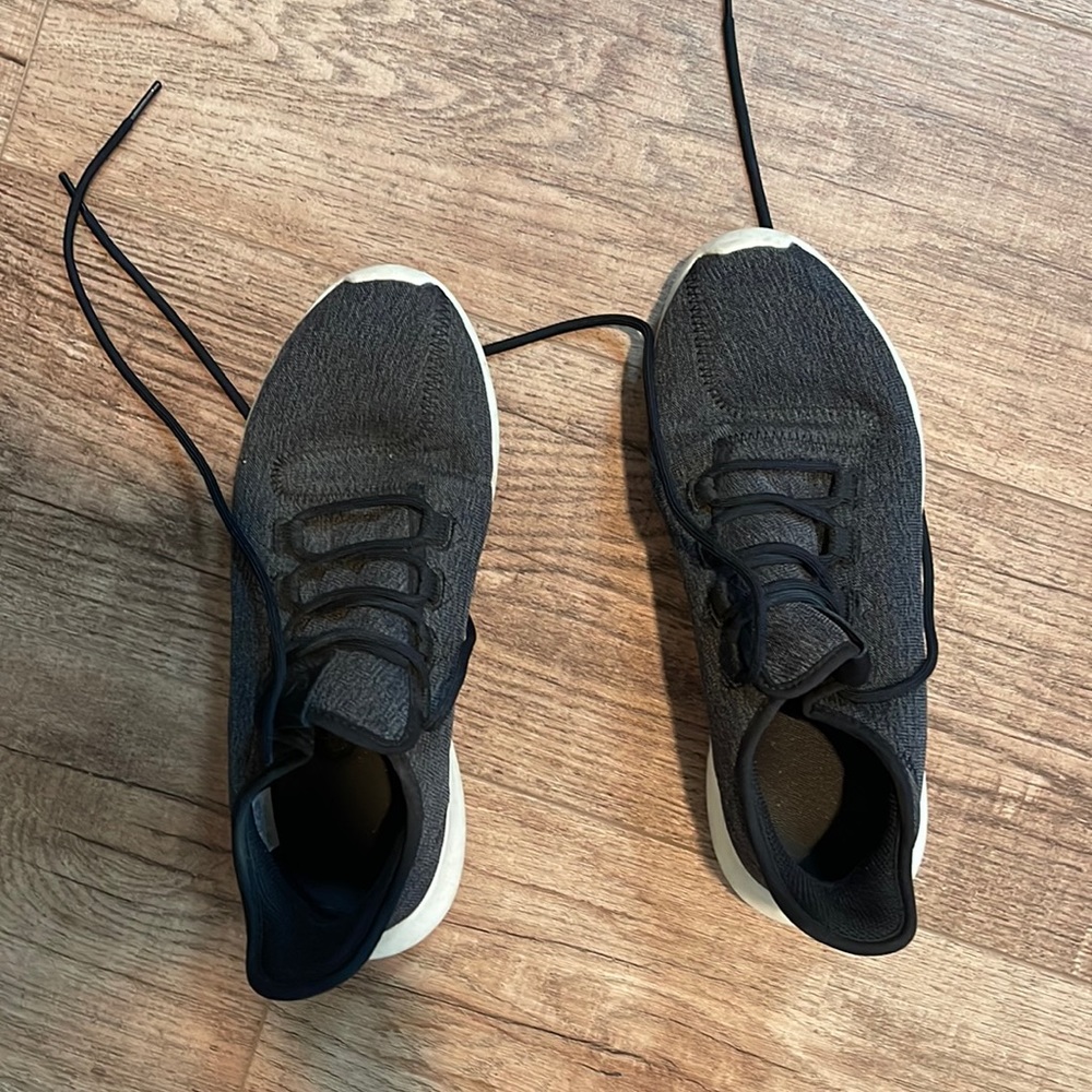 Grey and black adidas tennis shoes
